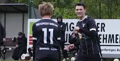 Top-Teams vor der Brust